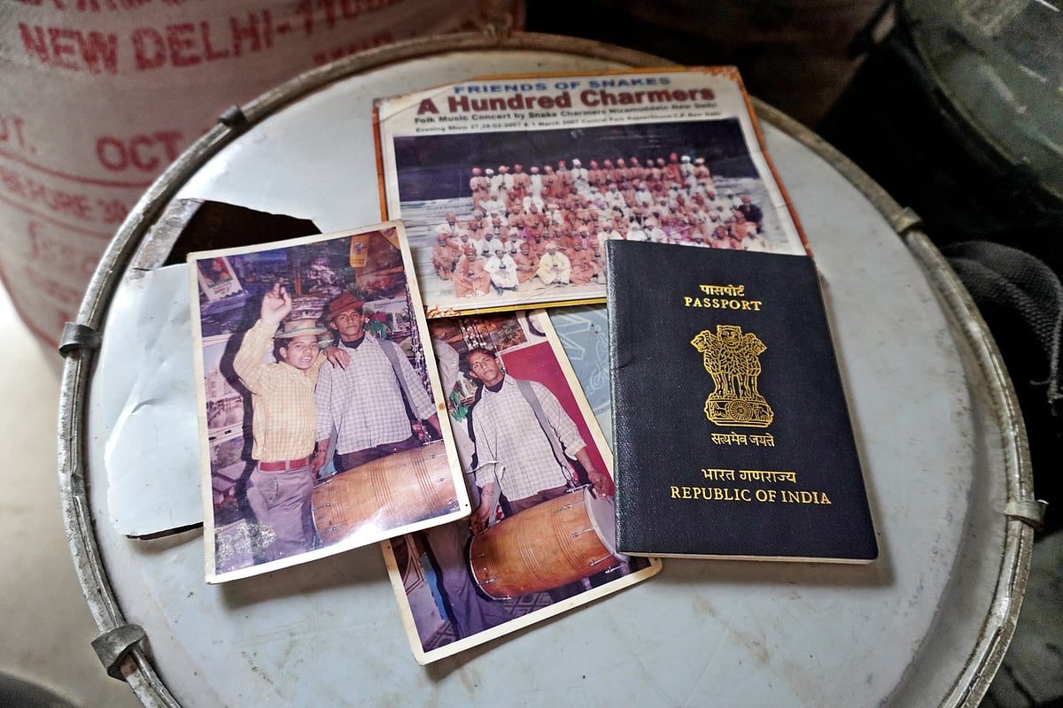 Sultans pictures from earlier days along with his passport