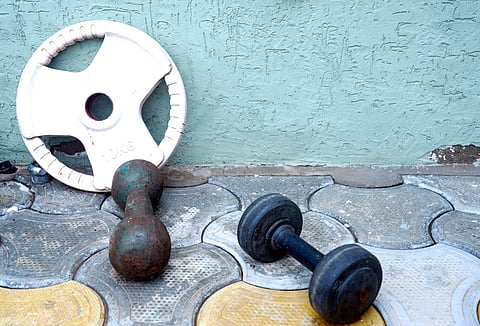 Gym equipments lay idle at Vinesh Phogat's home while the village awaits her return.