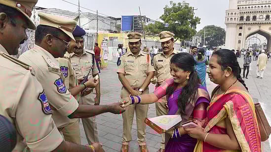 People distributing sweets among Hyderabad cops.(Representational image) |