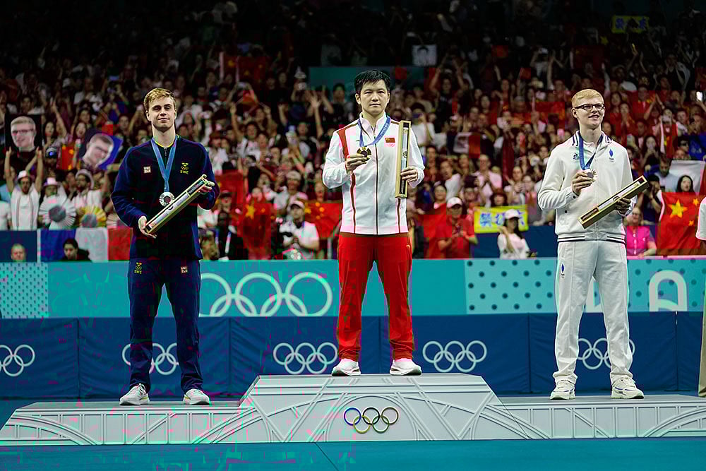 Photo: AP/Petros Giannakouris : Paris Olympics Table Tennis