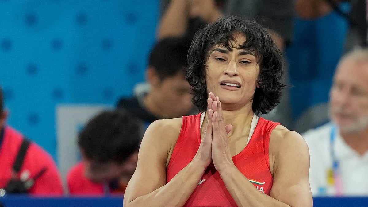 PTI Photo/Ravi Choudhary : Vinesh Phogat celebrates after winning her Women's Freestyle 50kg semi-final wrestling match against Cuba's Yusneylys Guzman Lopez at the 2024 Summer Olympics.