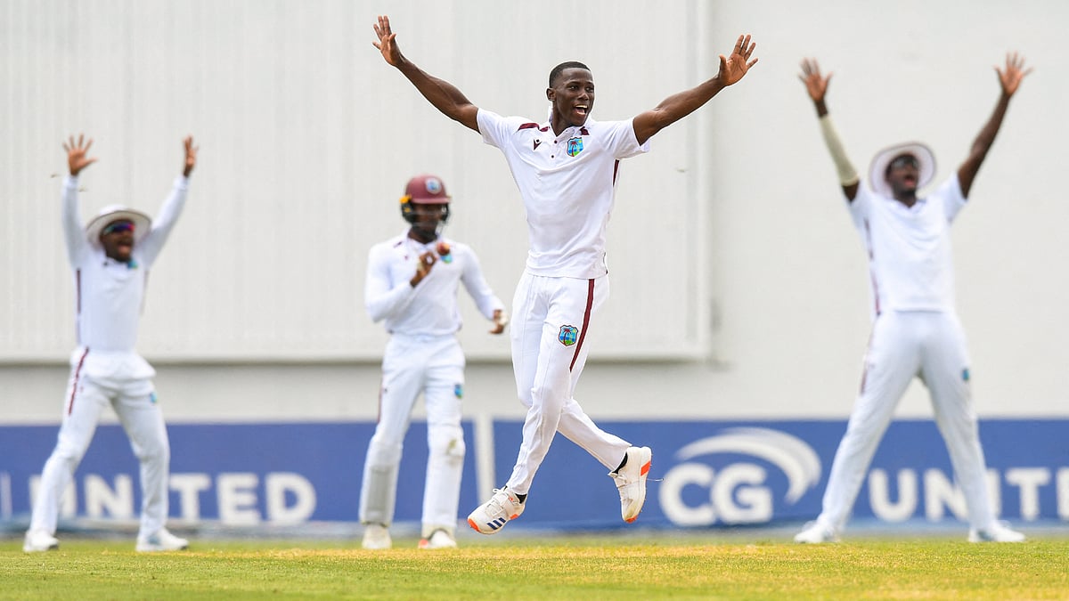 Shamar Joseph celebrates the dismissal of David Bedingham