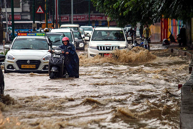waterlogged road after rains, in Dehradun
