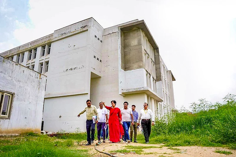Atishi inspects under construction school building at Kheda Village in Narela, Delhi