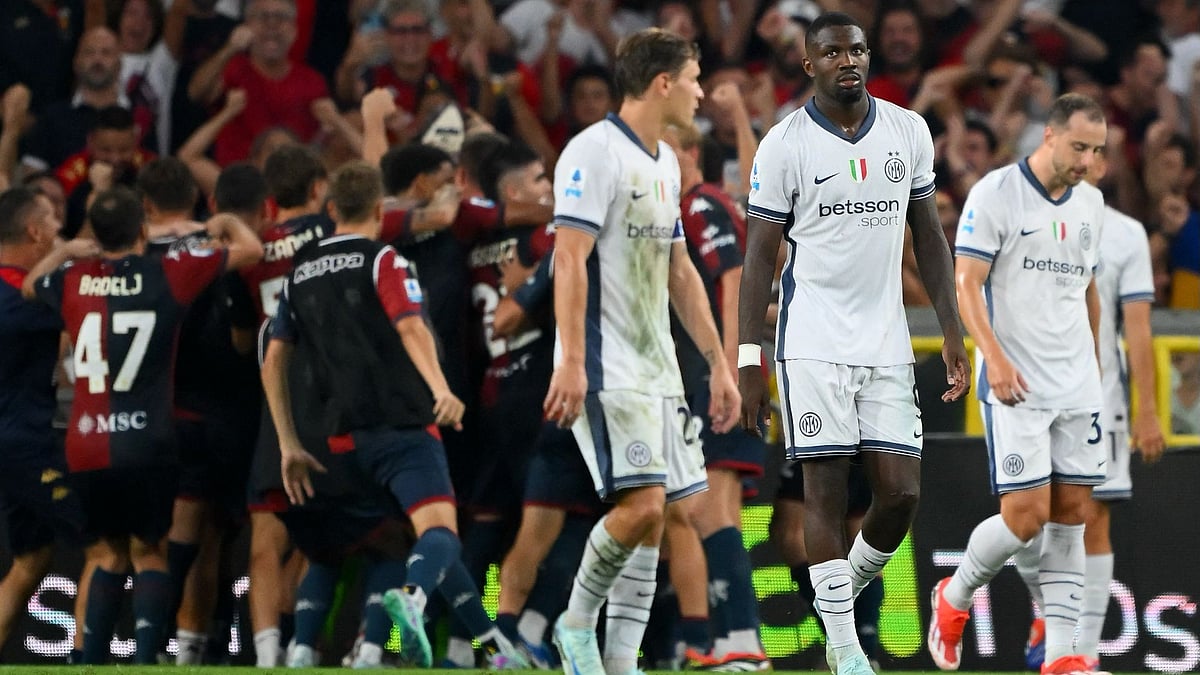 Thuram looks on after Genoa's late equaliser - null