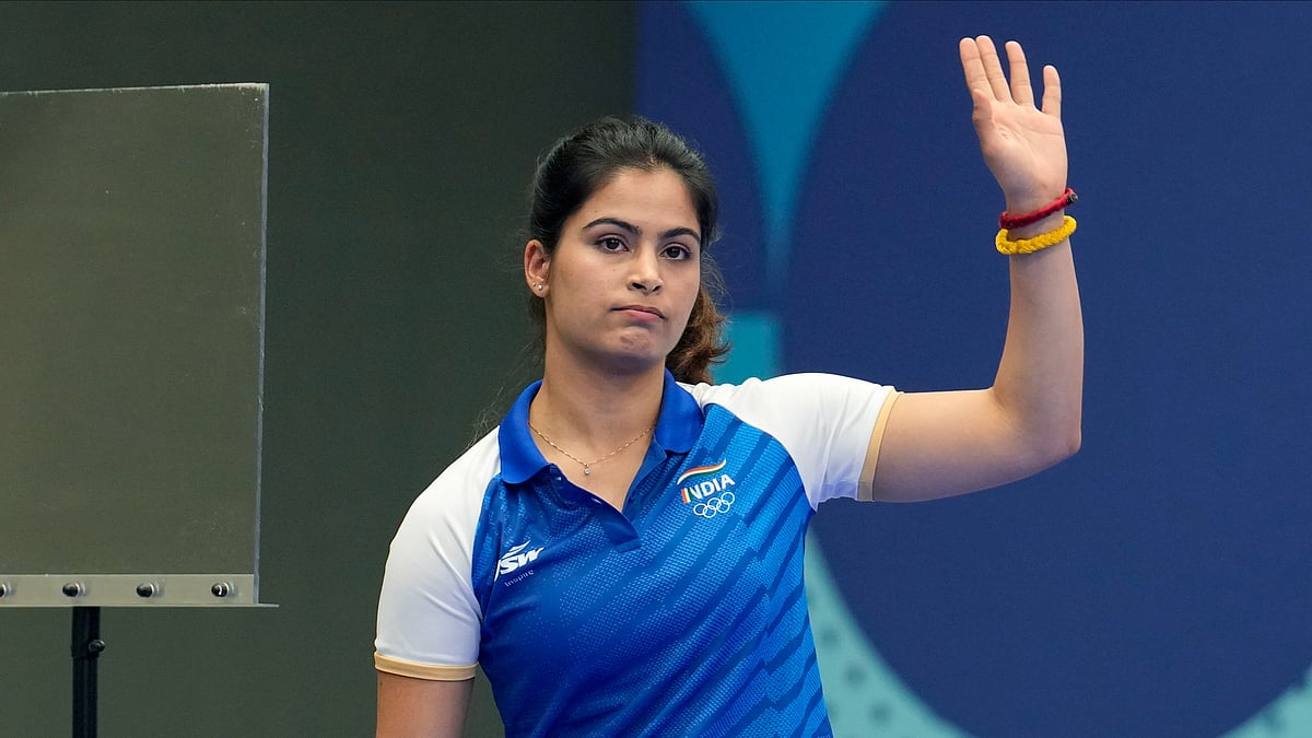AP Photo/Manish Swarup : India's Manu Bhaker reacts after getting eliminated from the 25m pistol women's final at the 2024 Summer Olympics.