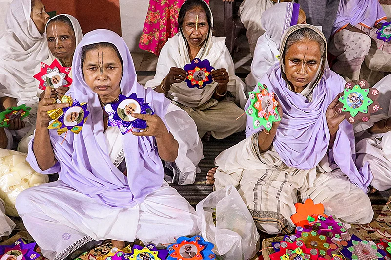 Widows display Rakhis made by them, that will be sent to Prime Minister Narendra Modi, in Vrindavan
