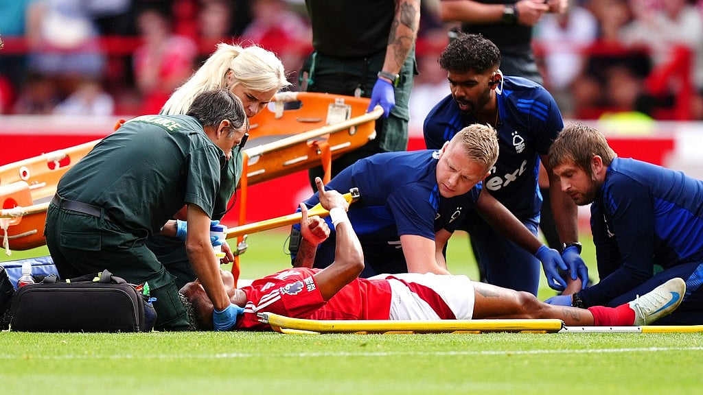 PA via AP/Mike Egerton : Nottingham Forest's Danilo shows a thumbs up as he receives treatment for an injury during the British Premier League soccer match between Nottingham Forest and AFC Bournemouth, at the City Ground, Nottingham, England, Saturday Aug. 17, 2024.