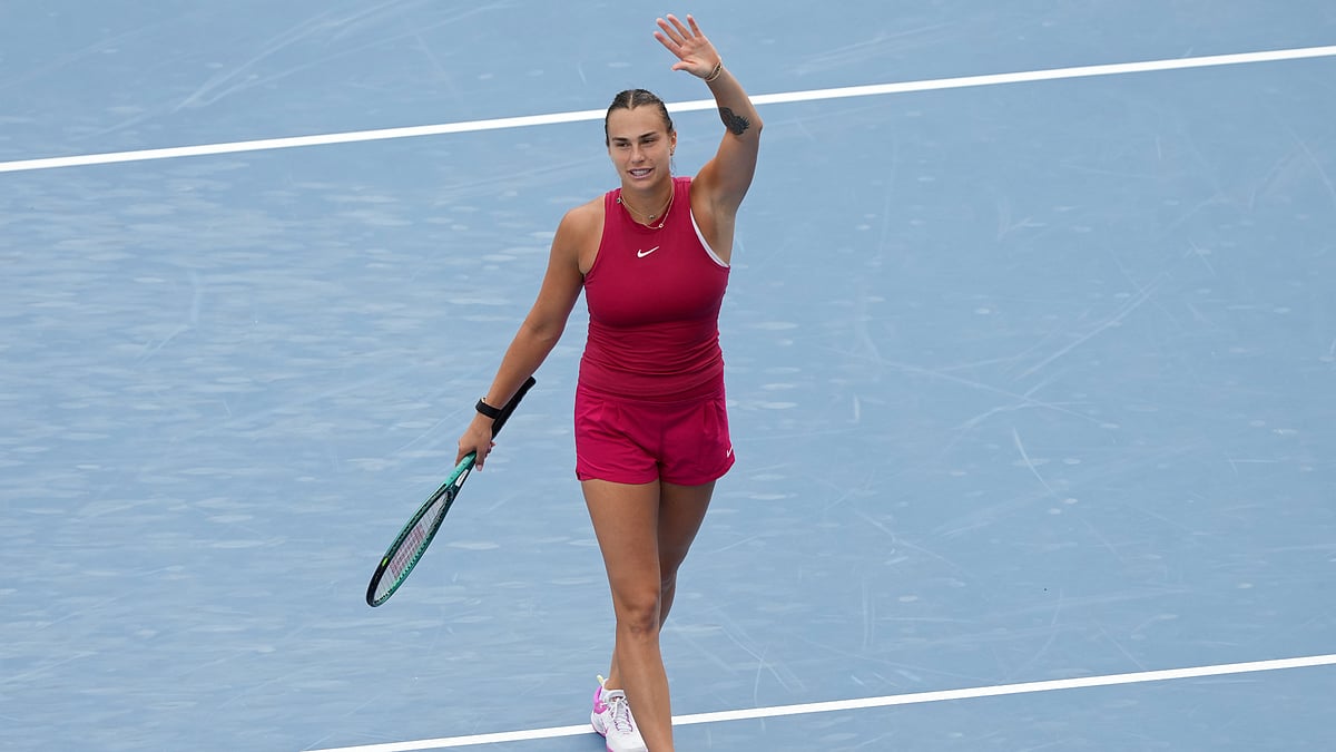 Aryna Sabalenka celebrates after defeating Iga Swiatek.