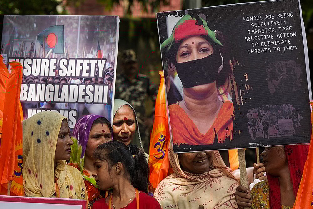 Photo: PTI/Shahbaz Khan : Protest over violence against minorities