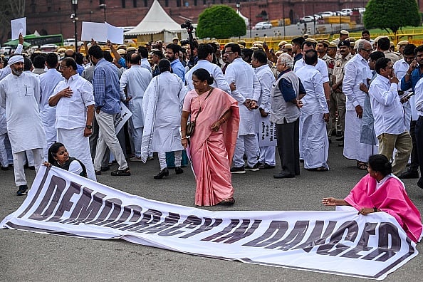 A protest, organised by Congress MPs Mallikarjun Kharge and other opposition MPs 