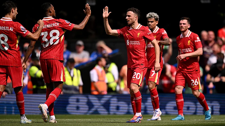 Diogo Jota believes his role in Arne Slot's Liverpool team helps him do what he does best. - null