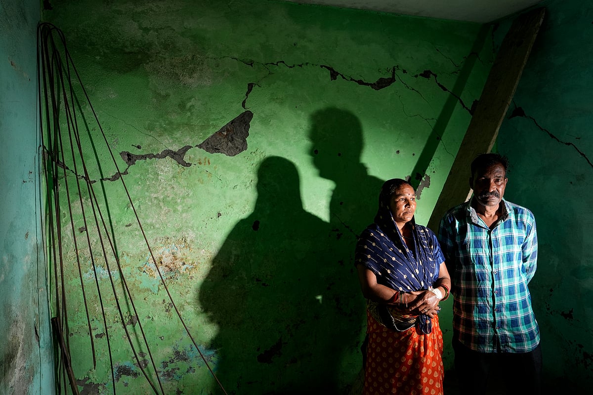 Dinesh Kumar and Satashri Devis home was declared unfit last year. They continue to live here