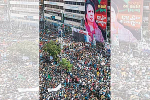 Photo: AP : Regime Change: Protesters in front of the BNP headquarters during a rally in Dhaka