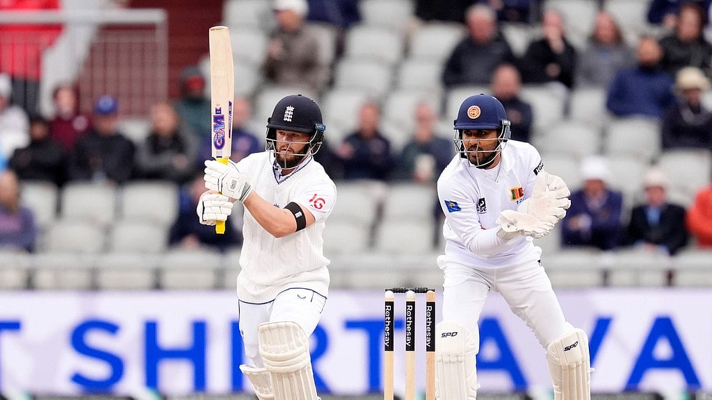 AP/Nick Potts : Ben Duckett (left) bats on Day 1 of the first Test between England and Sri Lanka in Manchester.