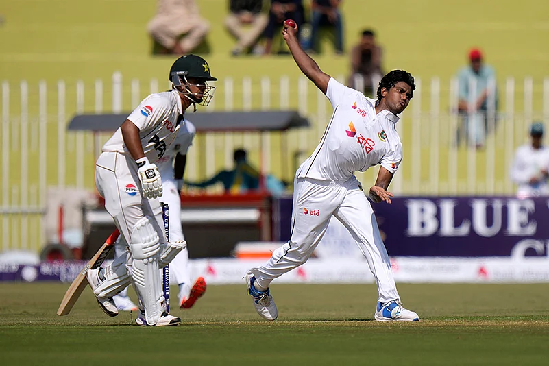 Pakistan vs Bangladesh 1st Cricket Test Day 1_ Hasan Mahmud, right, bowls against Pakistan