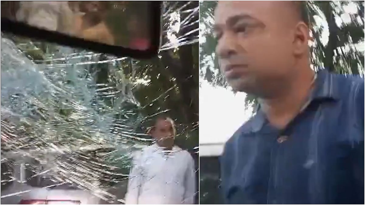 The man (R) was seen attacking the car in the video | 