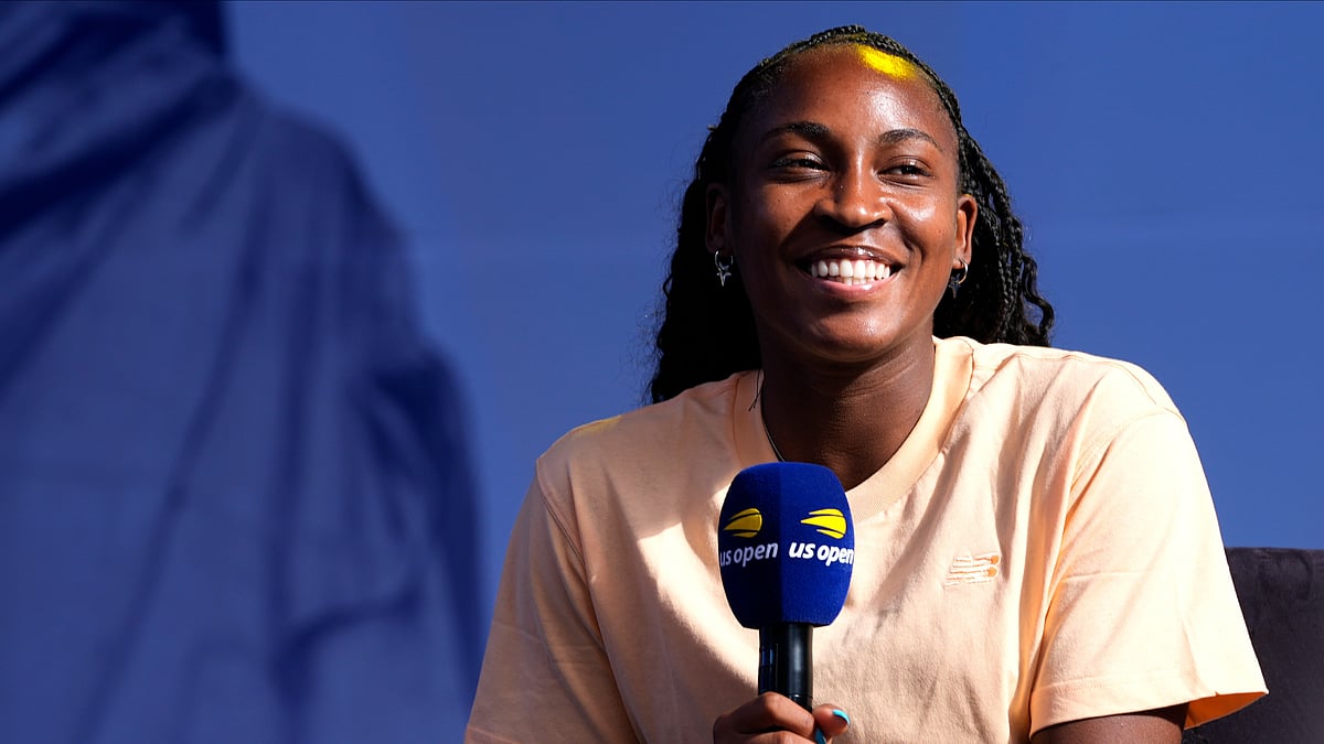 AP Photo/Pamela Smith : Coco Gauff smiles while speaking to the crowd at the US Open Fan Week at the USTA Billie Jean King National Tennis Center in New York.