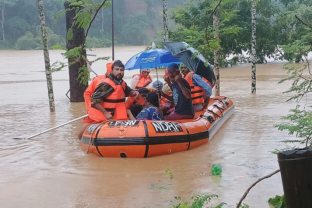 Photo: National Disaster Response Force via AP : Tripura floods: Rescue Op in Agartala