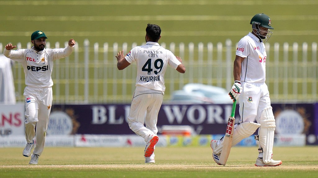 AP : Pakistan's Khurram Shahzad, center, celebrates after taking the wicket of Najmul Hossain Shanto, right,