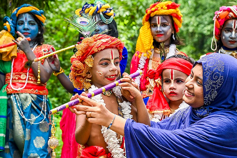 Child dressed as Lord Krishna for a Go Like Gopala competition during Janmashtami celebrations
