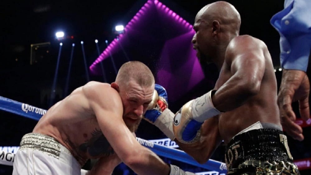 Floyd Mayweather (right) in action.