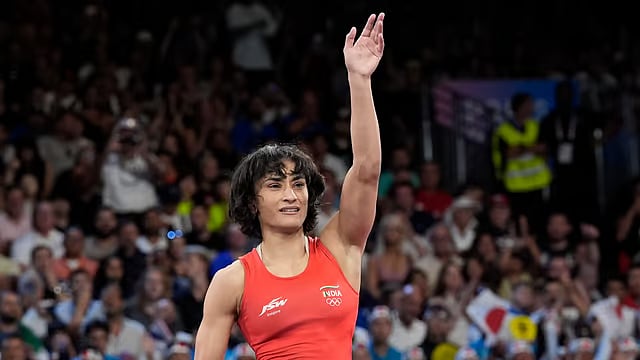 File photo of India's Vinesh Phogat celebrating after defeating Cuba's Yusneylys Guzman during their women's freestyle 50kg wrestling semi-final at the Paris Olympics on Tuesday (August 6). - AP