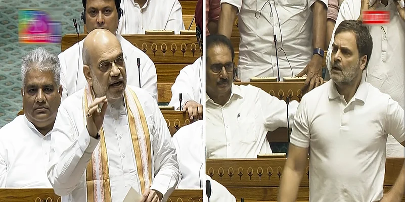 Home Minister Amit Shah and LoP Rahul Gandhi in Lok Sabha during Parliament session, in New Delhi