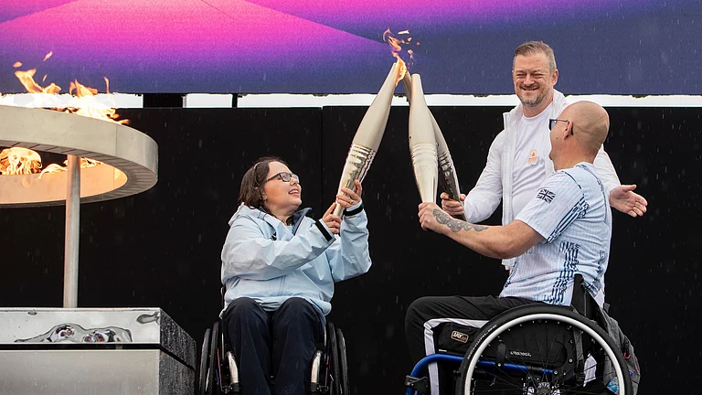 British Paralympians Helene Raynsford and Gregor Ewan light the Paralympic Flame in Stoke Mandeville, widely considered the birthplace of the Paralympic Games, England, Saturday, Aug. 24, 2024. The Paralympic Games are set to open Wednesday as some 4,400 athletes with disabilities, permanent injuries or impairments prepare to compete for 549 medals across 22 sports over 11 days in Paris. - AP/Thomas Krych