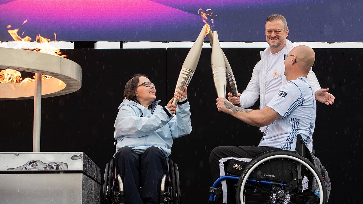 AP/Thomas Krych : British Paralympians Helene Raynsford (left) and Gregor Ewan light the Paralympic Flame in Stoke Mandeville, England on Saturday ( August 24, 2024).