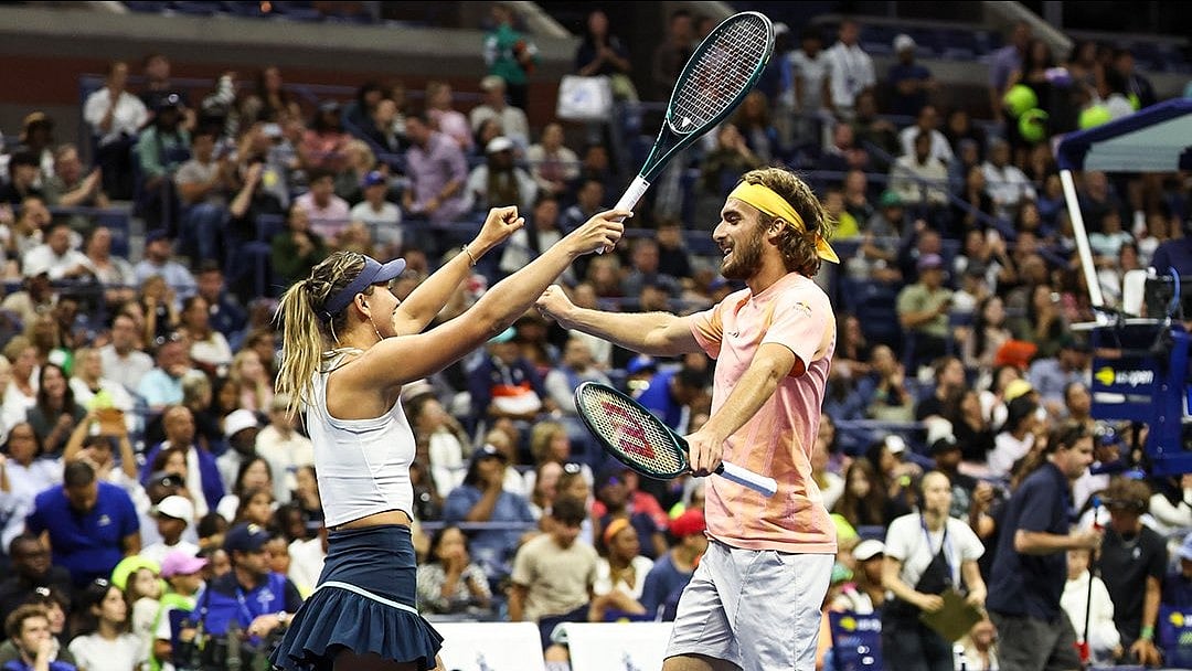 X | US Open  : Paula Badosa and Stefanso Tsitipas at the US Open mixed doubles. 
