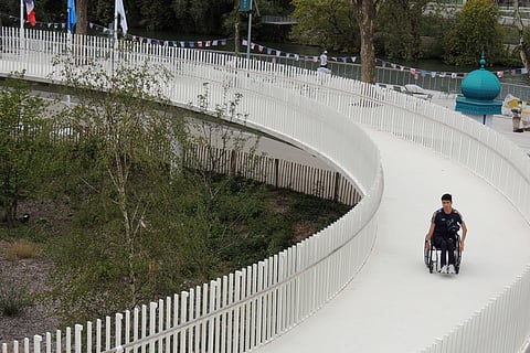 A para athlete in a wheelchair using a ramp in the Paralympic Games Village, in Saint-Ouen, France.