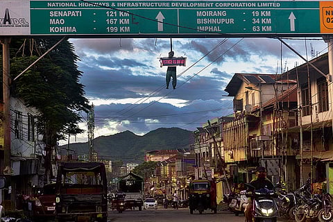 A placard on an effigy in Churachandpur