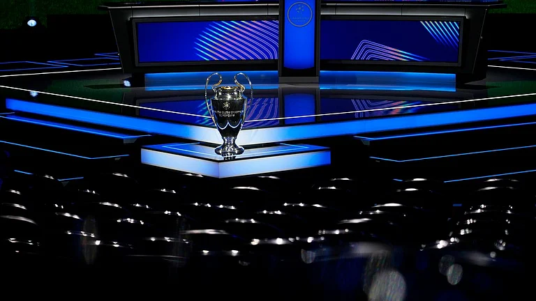 The trophy is displayed in the hall ahead of the Champions League, league phase, draw, in Monaco. - AP