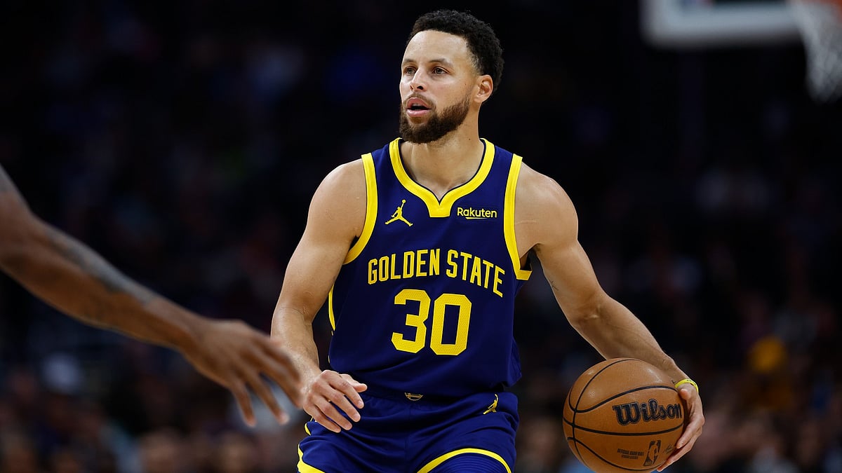 Stephen Curry's 37-point haul helped the Golden State Warriors hold off the Brooklyn Nets.