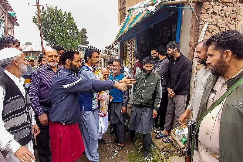 Congress leader Ghulam Ahmad Mir campaigns ahead of J& K Assembly elections