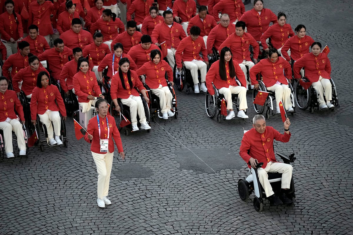 (AP Photo/Aurelien Morissard) : China's delegation parade during the Opening Ceremony for the 2024 Paralympics, Thursday, Aug. 29, 2024, in Paris, France. 