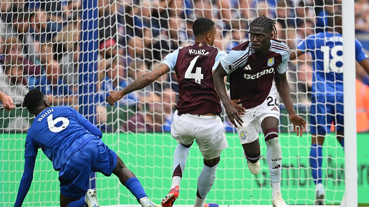 Amadou Onana wheels away after scoring Aston Villa's first goal