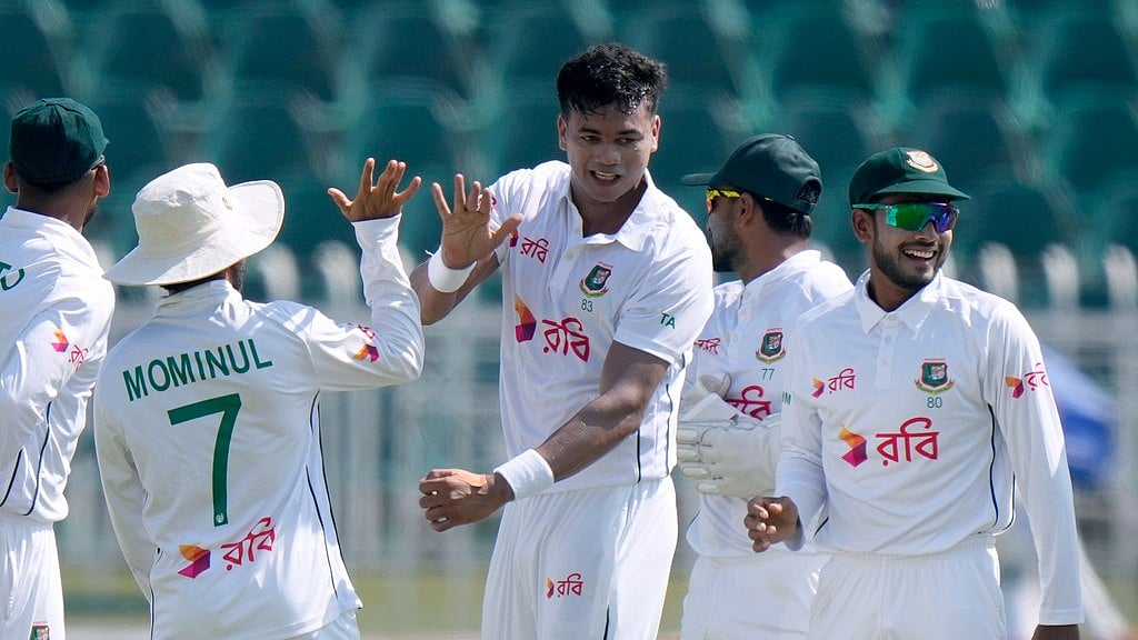 AP/Anjum Naveed : Bangladesh's Taskin Ahmed (centre) celebrates with teammates after dismissing Pakistan opener Abdullah Shafique in the second Test, in Rawalpindi.