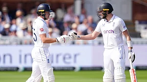 John Walton/PA via AP : England's Gus Atkinson, right, and Matthew Potts prepare to bat during day two of the second Rothesay Men's Test cricket match between England and Sri Lanka at Lord's.