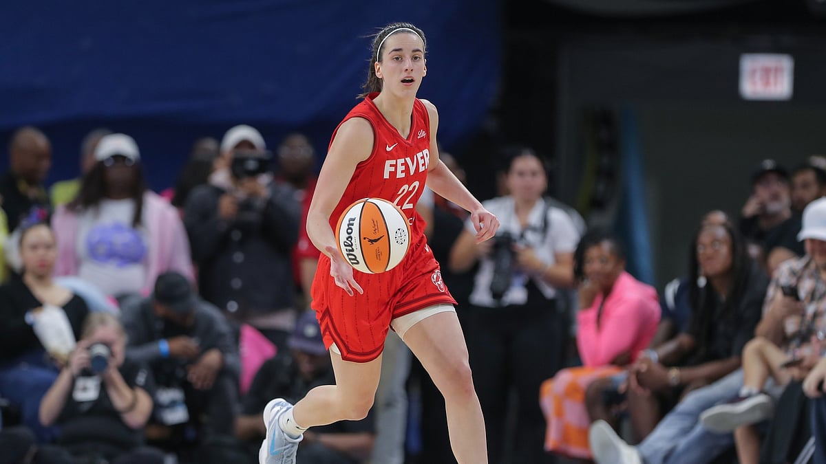 Caitlin Clark of the Indiana Fever brings the ball up court during the first half of a WNBA game against the Chicago Sky on August 30, 2024 at Wintrust Arena in Chicago, Illinois.