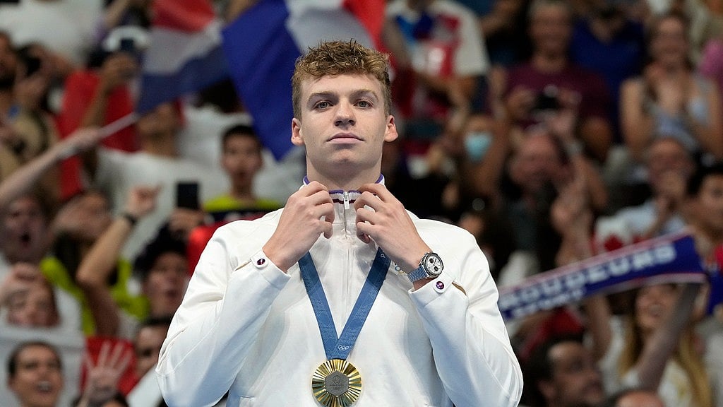 AP/Natacha Pisarenko : France's Leon Marchand won the 200m individual medley final at the Paris Olympics on Friday (August 2).