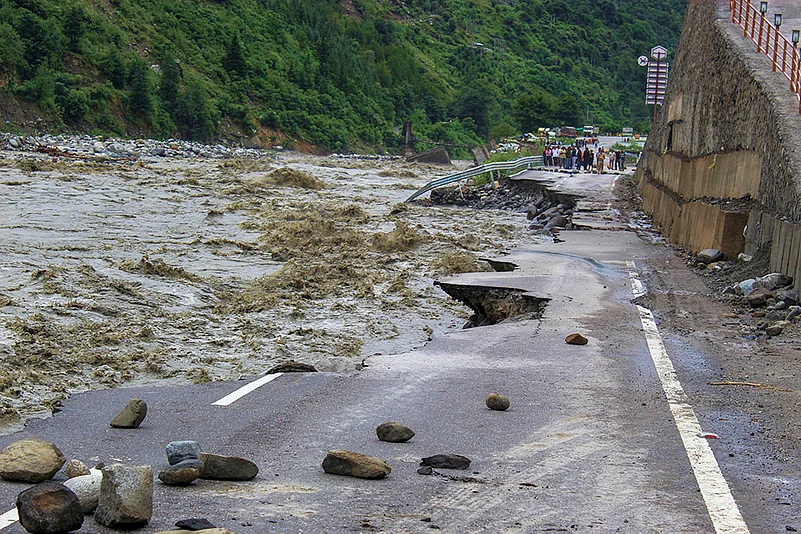 Damaged Manali-Chandigarh highway after Cloudburst in Kullu