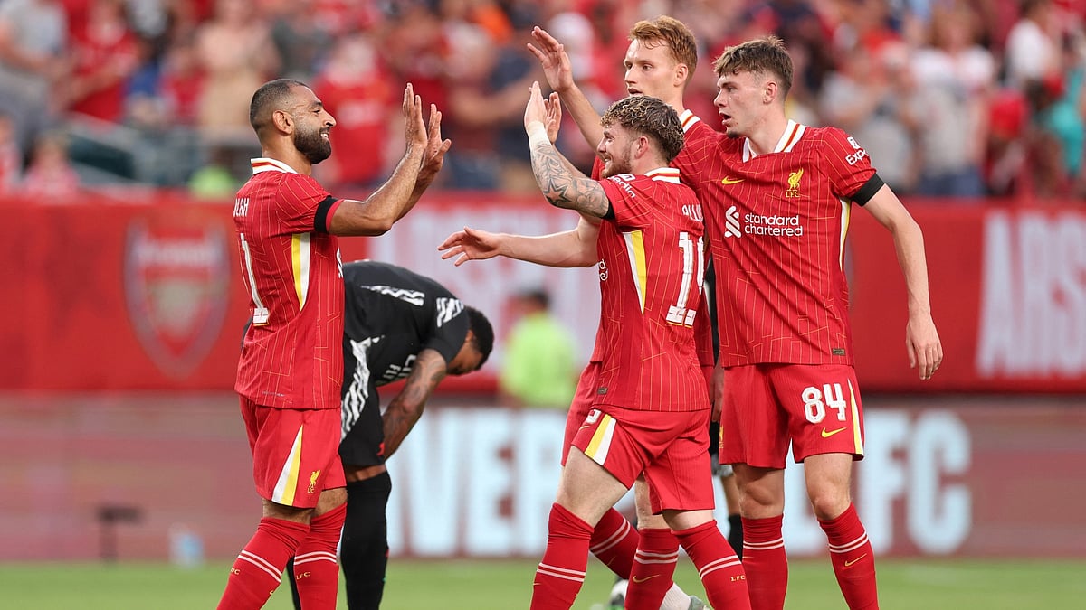 Liverpool's Mohamed Salah and Harvey Elliott celebrate.
