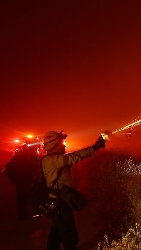 Firefighters trying to contain Park fire.