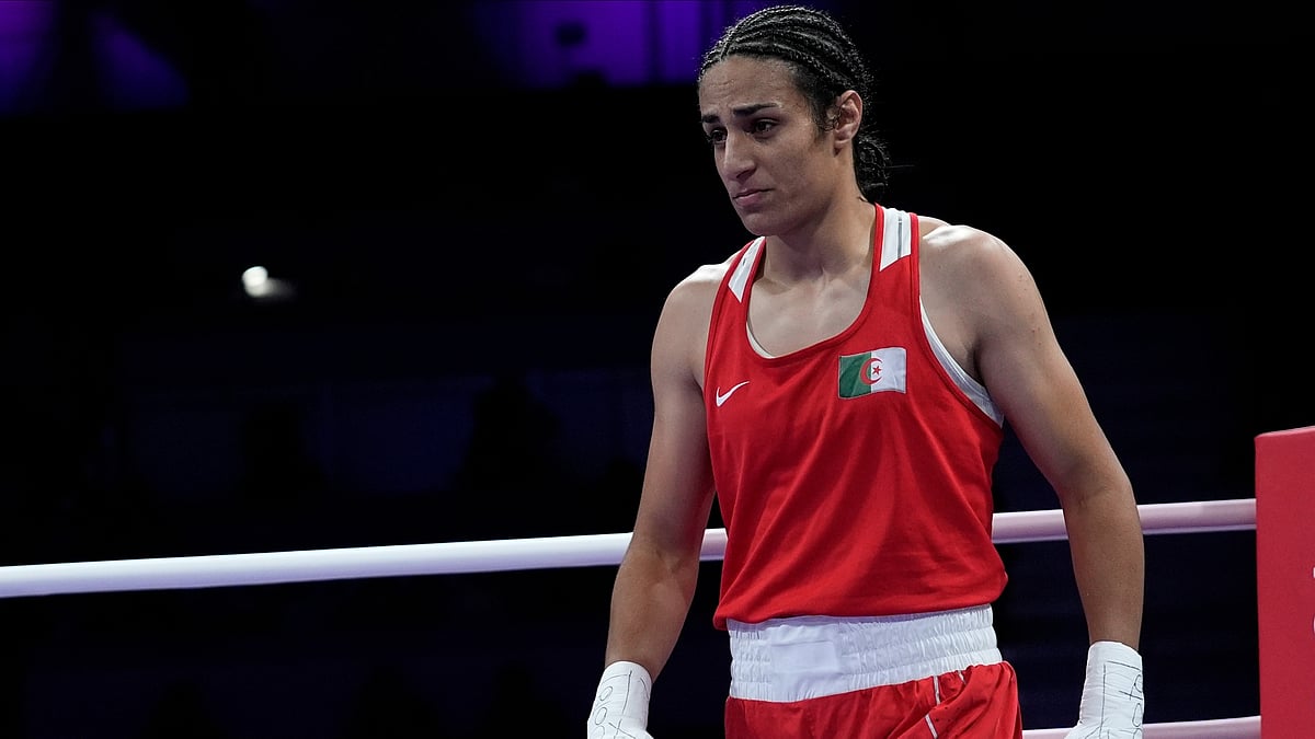 AP Photo/John Locher
 : Algeria's Imane Khelif, reacts after defeating Italy's Angela Carini in their women's 66kg preliminary boxing match at the 2024 Summer Olympics, Thursday, Aug. 1, 2024, in Paris, France.