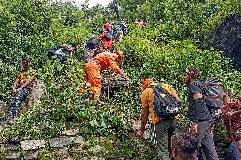 NDRF personnel evacuating stranded pilgrims after Cloudburst in Kedarnath