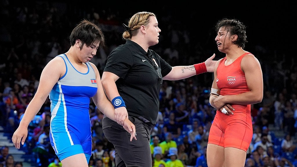 AP/Eugene Hoshiko : India's Nisha Dahiya is in tears after losing her quarter-final bout against North Korea's Sol Gum Pak at the Paris Olympics.