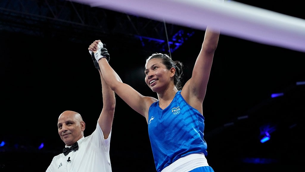 AP/Ariana Cubillos : Lovlina Borgohain celebrates after defeating Norway's Sunniva Hofstad in their women's 75 kg preliminary boxing match at the 2024 Summer Olympics.