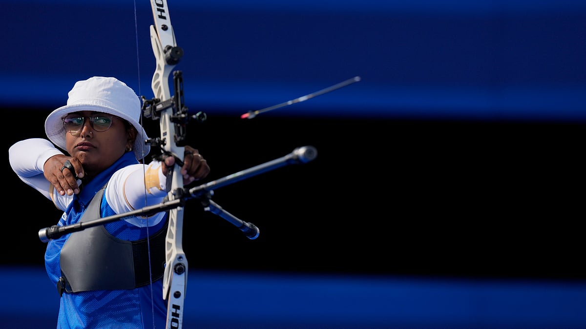 AP Photo/Brynn Anderson : India's Deepika Kumari shoots during the Archery individual quarterfinal against Germany at the 2024 Summer Olympics, Saturday, Aug. 3, 2024, in Paris, France. (